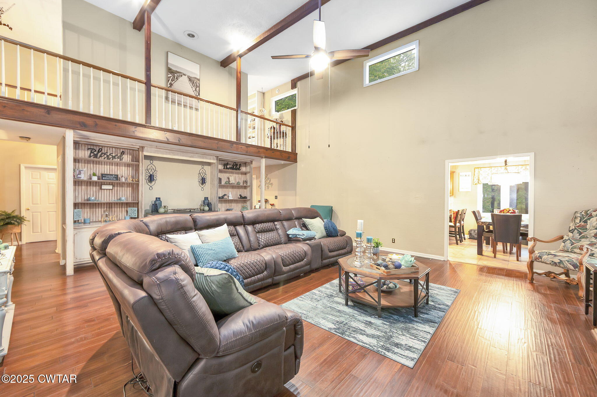 117 Tuckahoe Road Jackson, TN 38305 - Photo 7 of 57 a living room with furniture or couch and a wooden floor