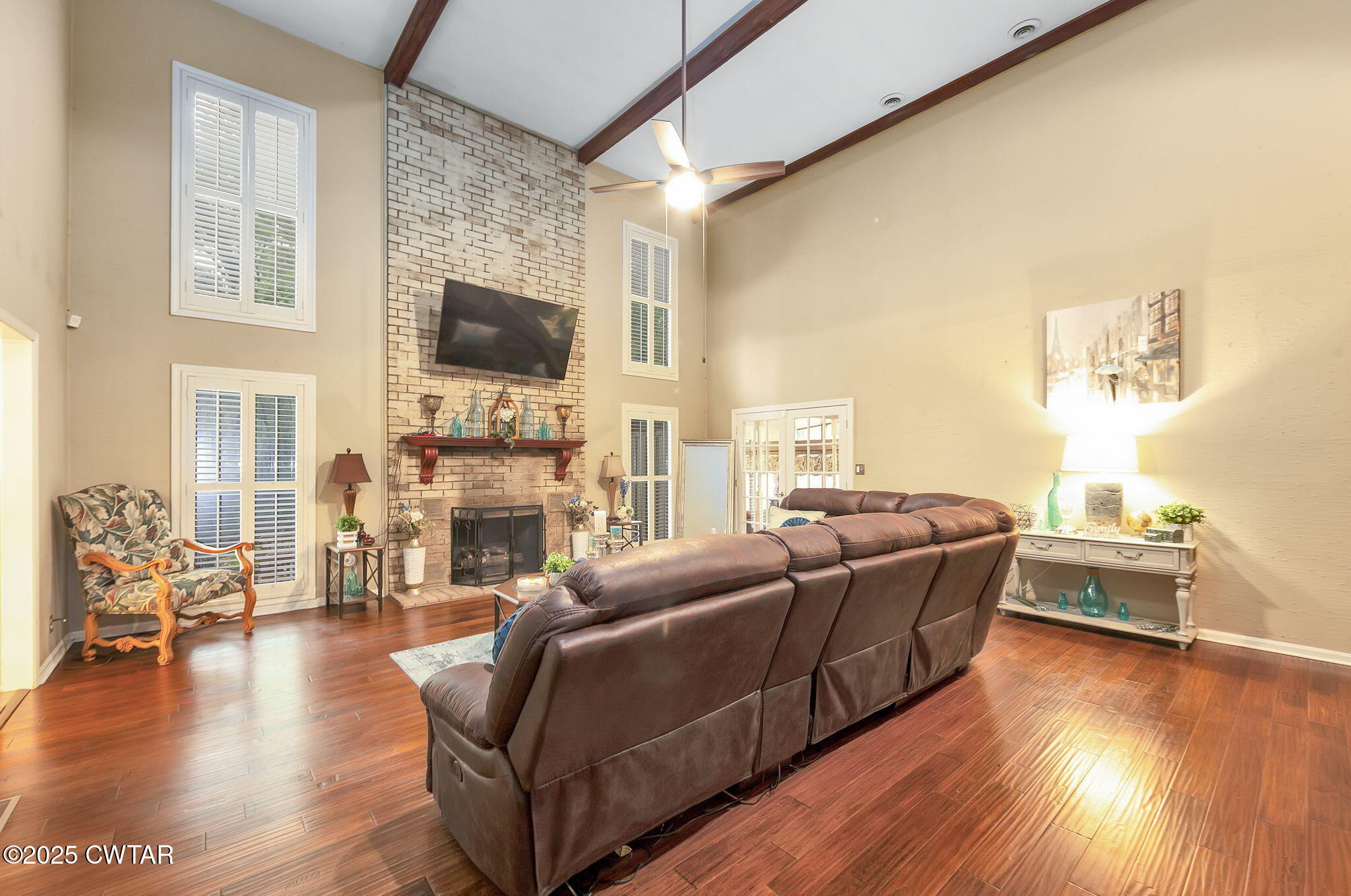 117 Tuckahoe Road Jackson, TN 38305 - Photo 8 of 57 a living room with furniture and a flat screen tv