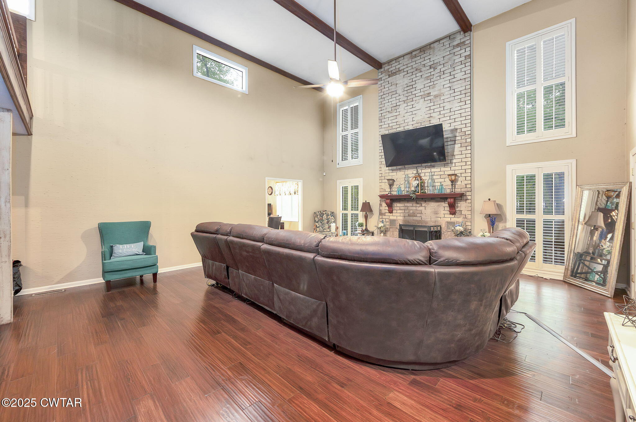 117 Tuckahoe Road Jackson, TN 38305 - Photo 9 of 57 a living room with furniture and a flat screen tv