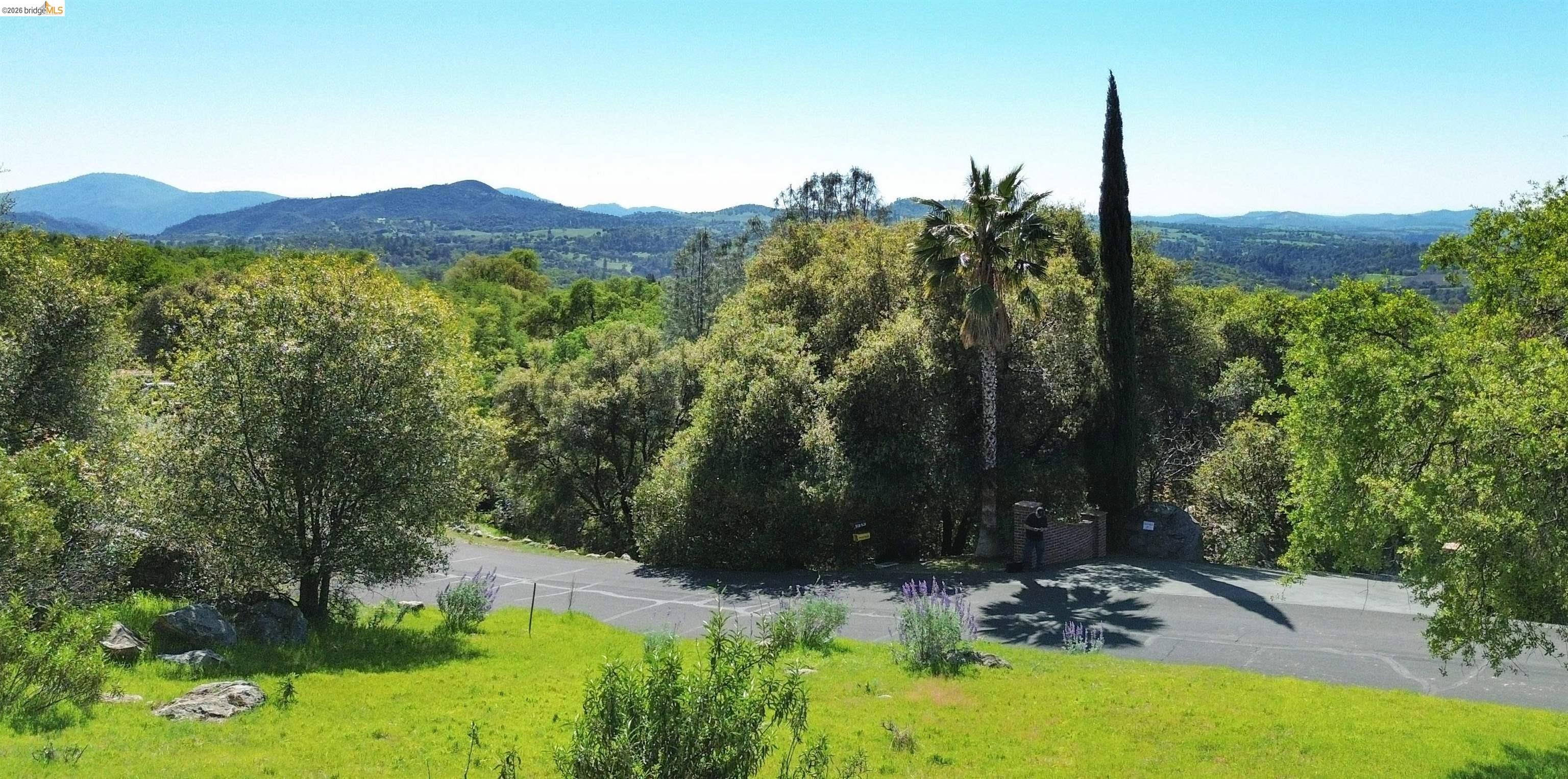18351 Olov Road Sonora, CA 95370 - Photo 28 of 29 View of mountain background with a forest