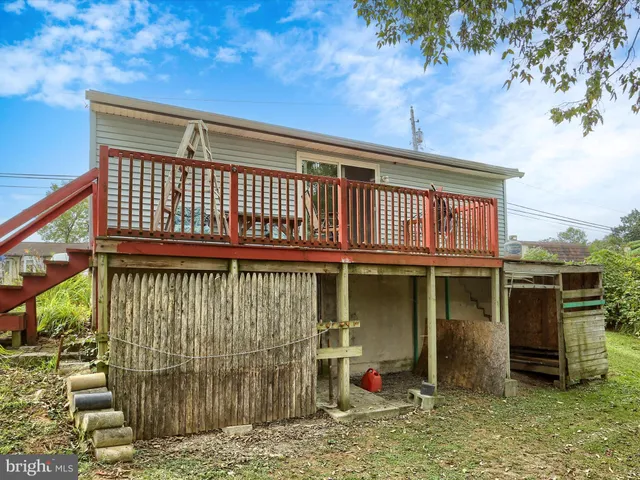 a view of a brick house with many windows