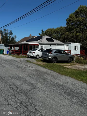 a car parked in front of a house