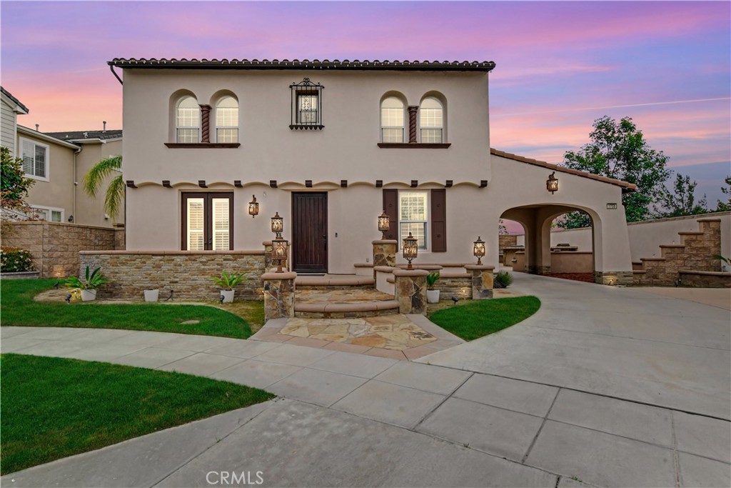 1758 Pitassi Way Upland, CA 91784 - Photo 1 of 1 a front view of a house with garden