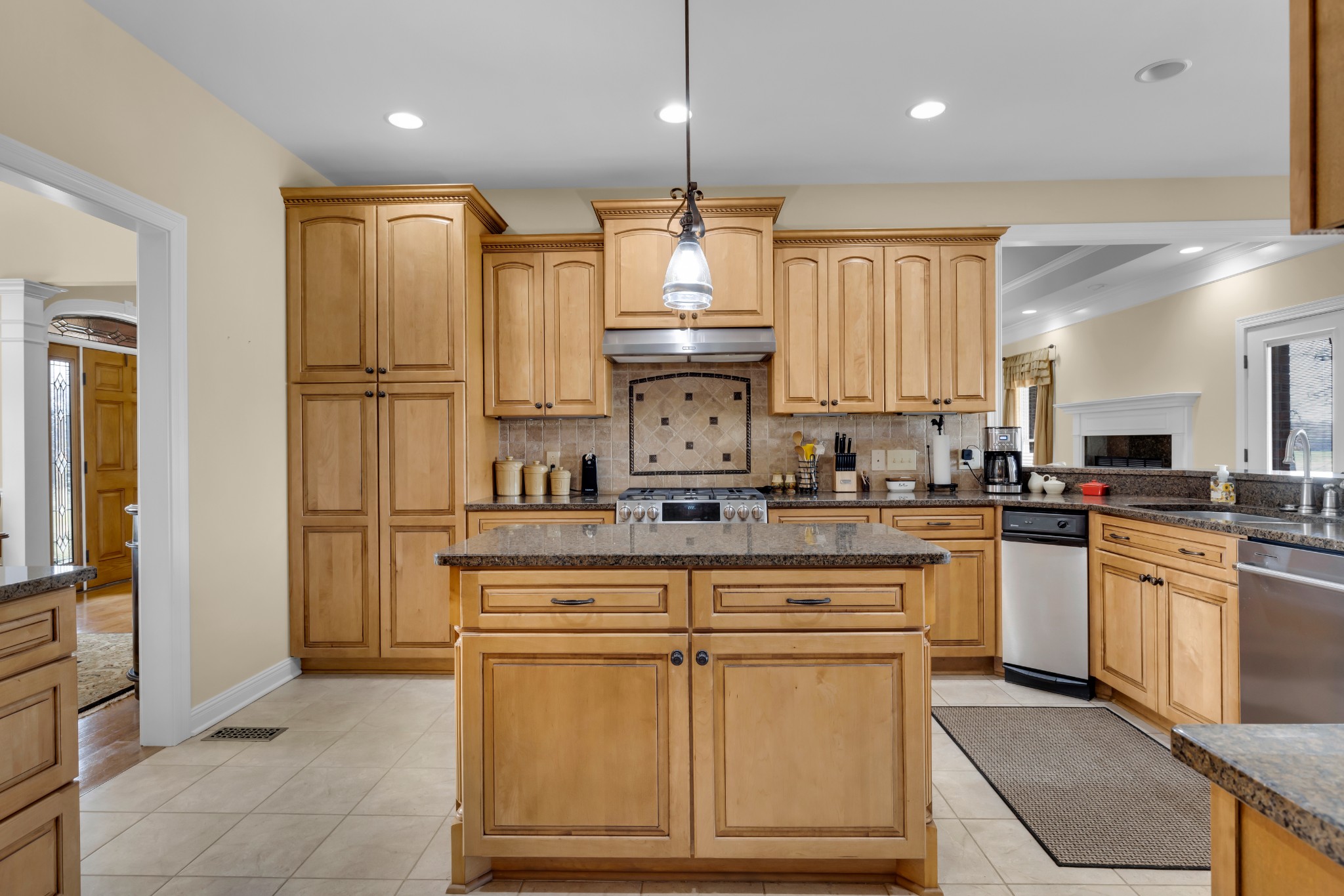 5144 Drake Road Cedar Hill, TN 37032 - Photo 13 of 80 a kitchen with stainless steel appliances granite countertop a stove a sink and a refrigerator
