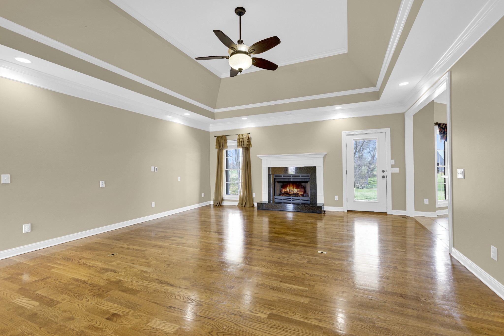 5144 Drake Road Cedar Hill, TN 37032 - Photo 40 of 80 a view of an empty room with a window and a ceiling fan