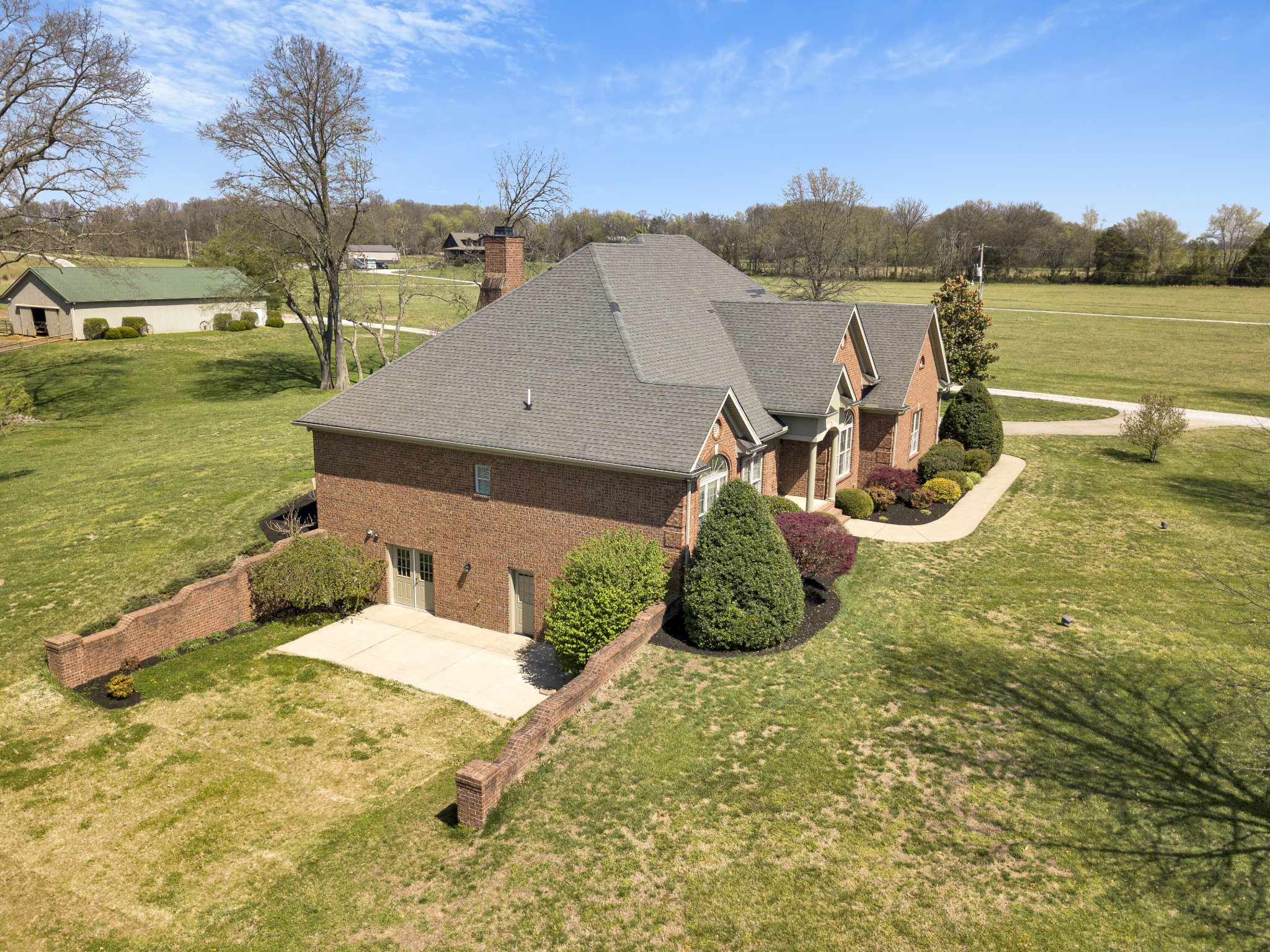 5144 Drake Road Cedar Hill, TN 37032 - Photo 5 of 80 a view of a house with a backyard