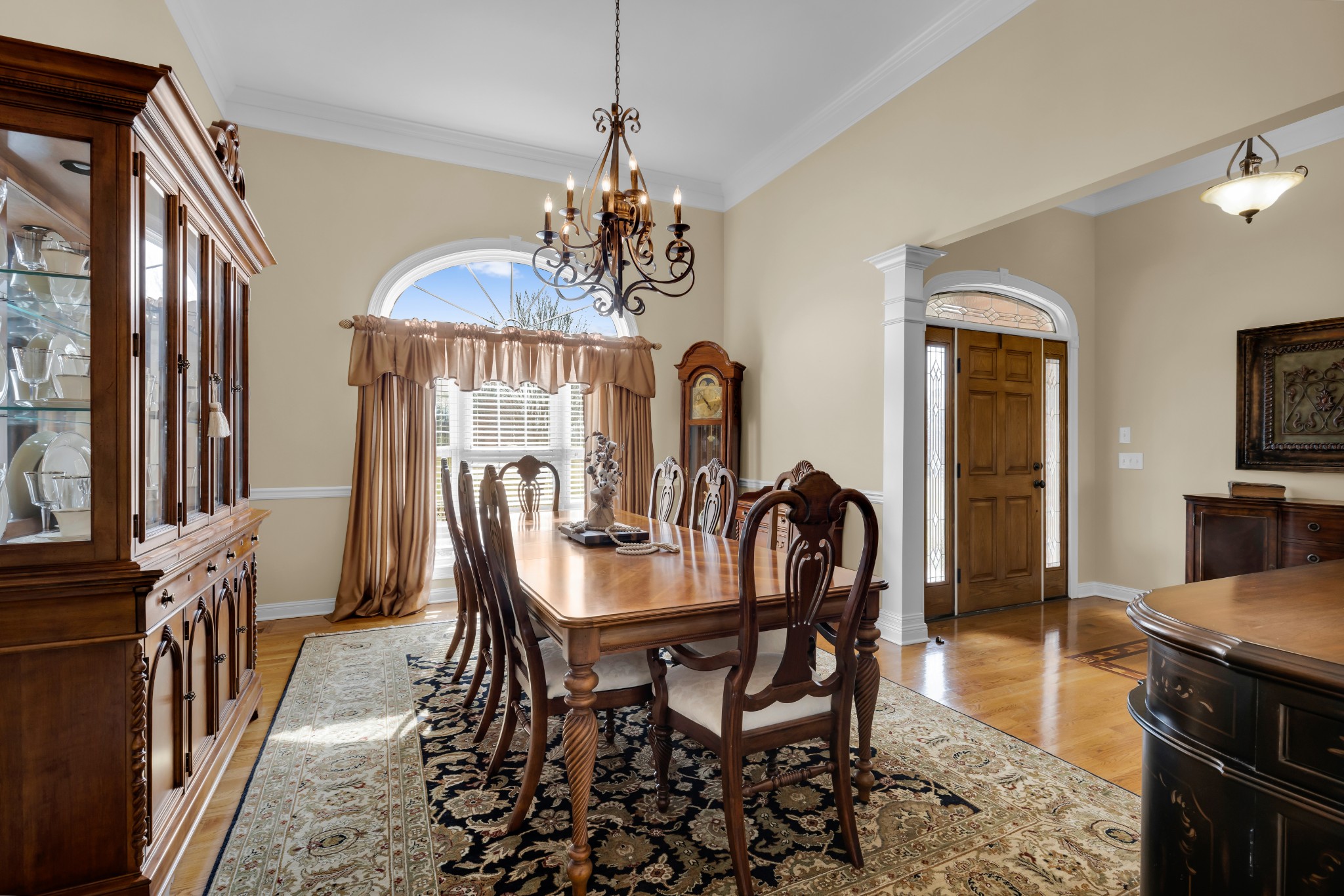 5144 Drake Road Cedar Hill, TN 37032 - Photo 9 of 80 a dining room with furniture a chandelier and wooden floor