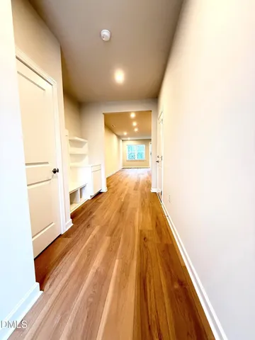 a view of a living room with a bed