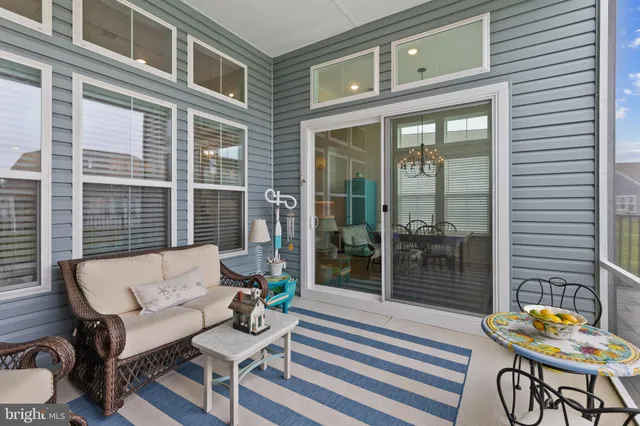 a outdoor living space with patio furniture and a potted plant