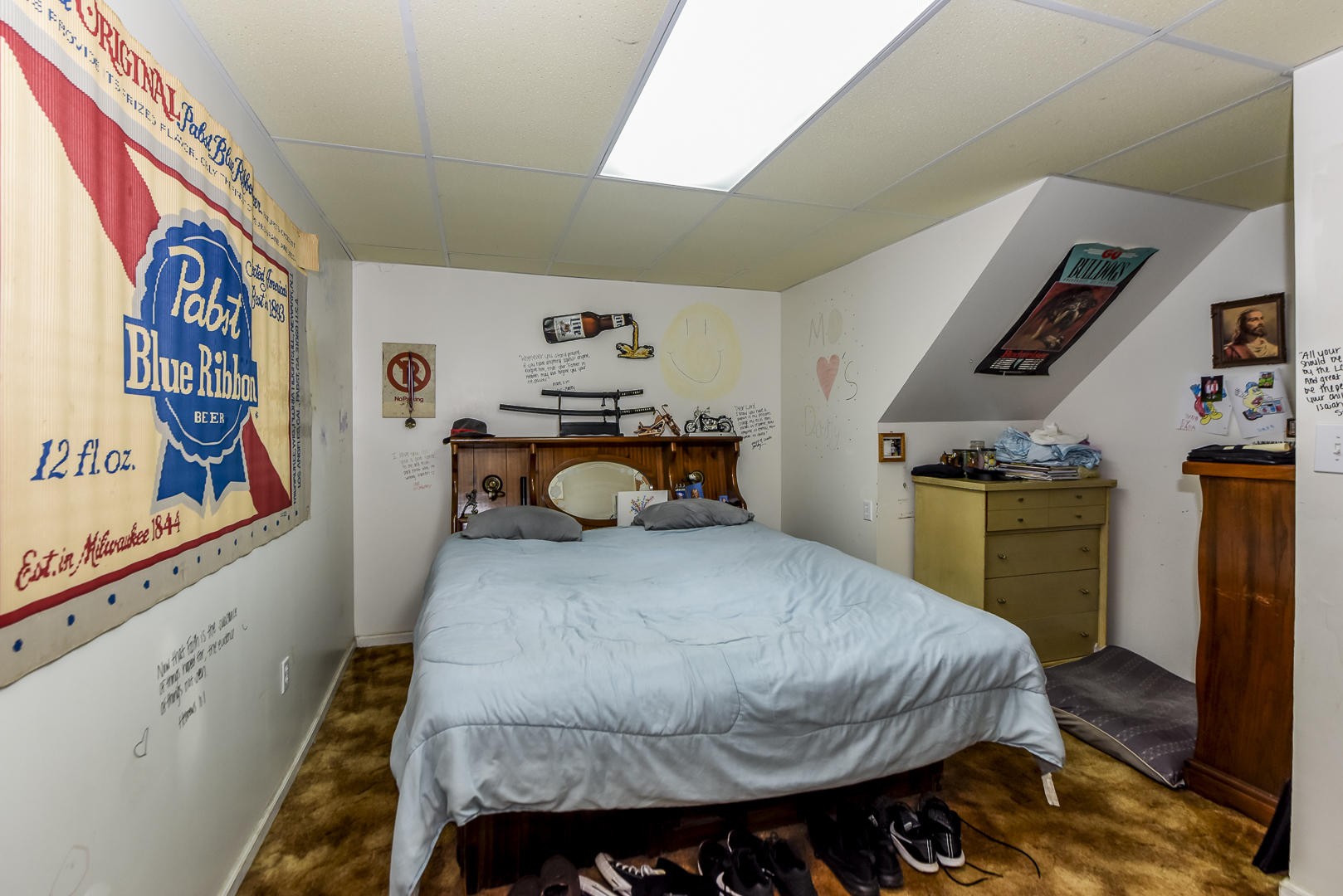 2598 Maple Hill Road Loudon, TN 37774 - Photo 19 of 36 a bedroom with a bed and wooden floor