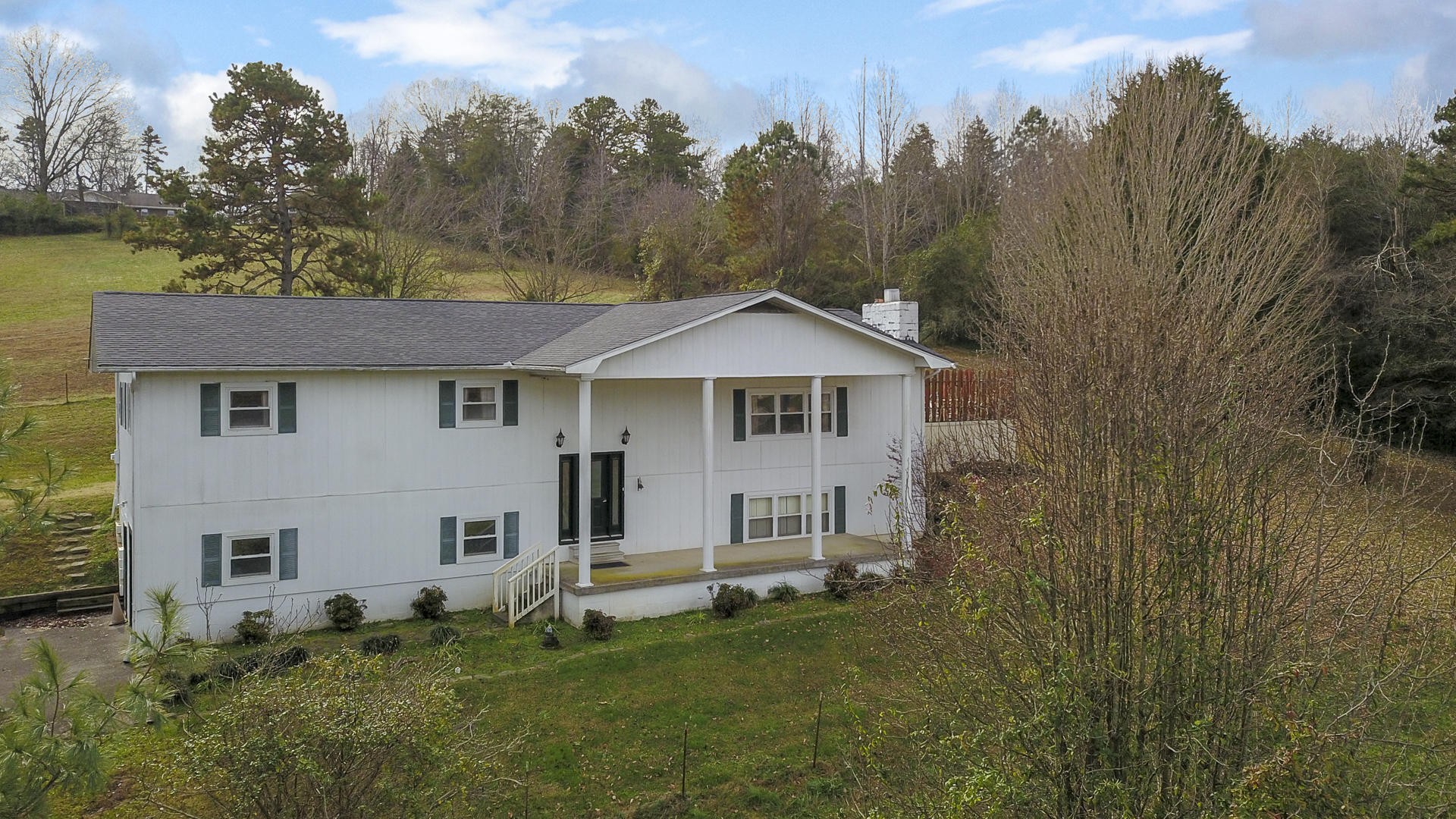 2598 Maple Hill Road Loudon, TN 37774 - Photo 33 of 36 a view of a house with a yard