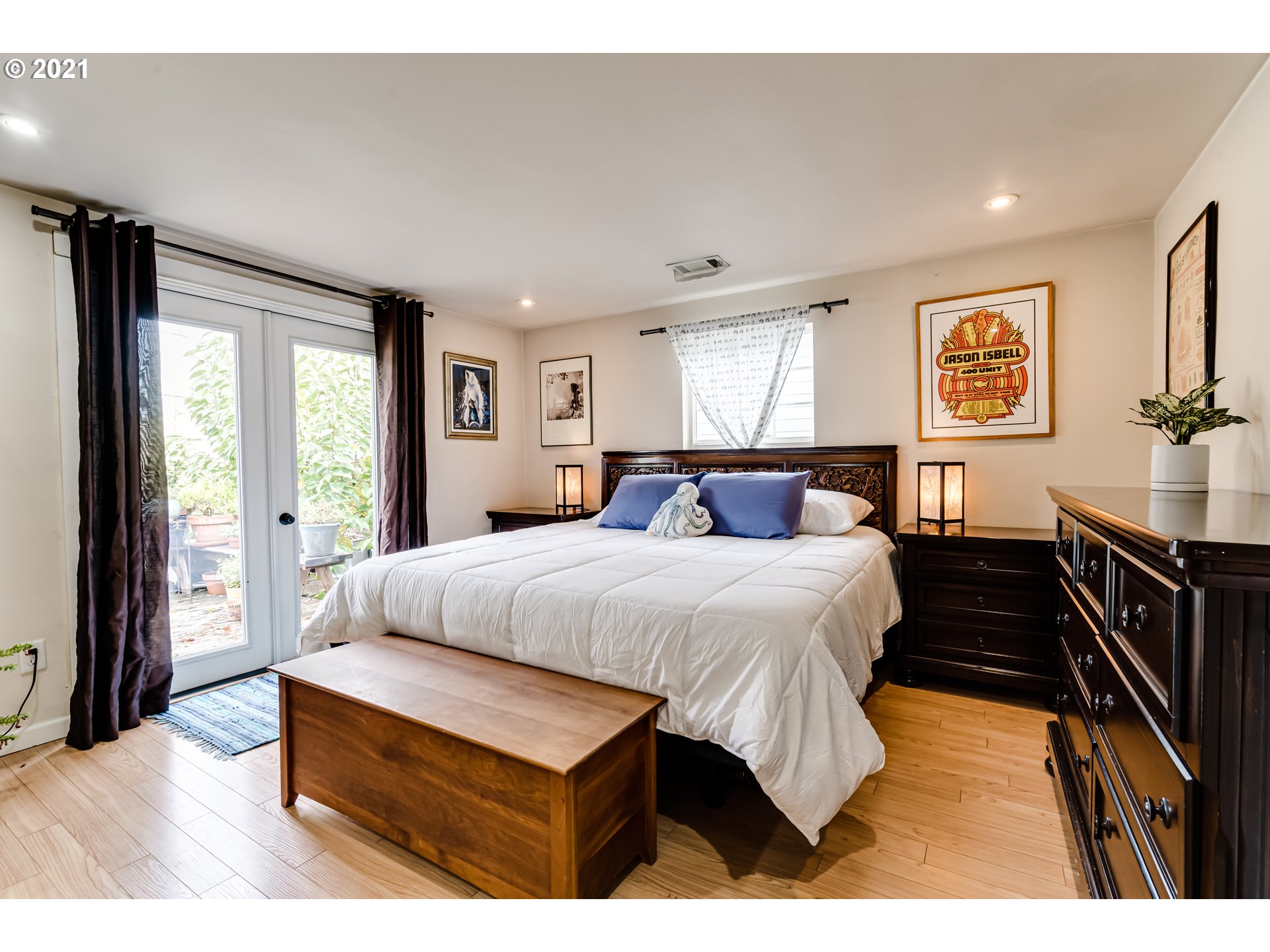 3250 B Street Springfield, OR 97478 - Photo 9 of 31 a bedroom with a bed and wooden floor