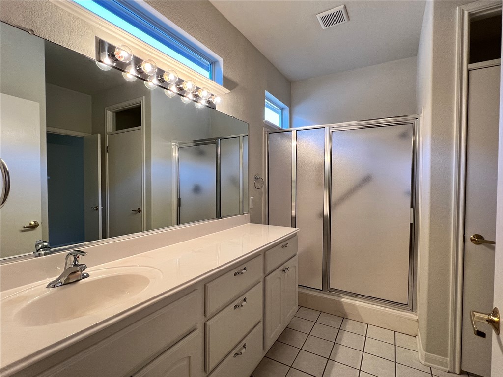 167 Whispering Wind Drive Georgetown, TX 78633 - Photo 9 of 29 Master bath with walk-in shower