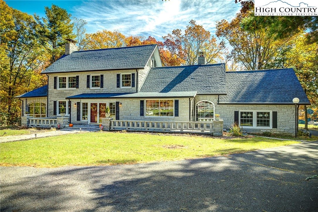 267 Vestal Road Sparta, NC 28675 - Photo 1 of 43 a view of a house with a swimming pool