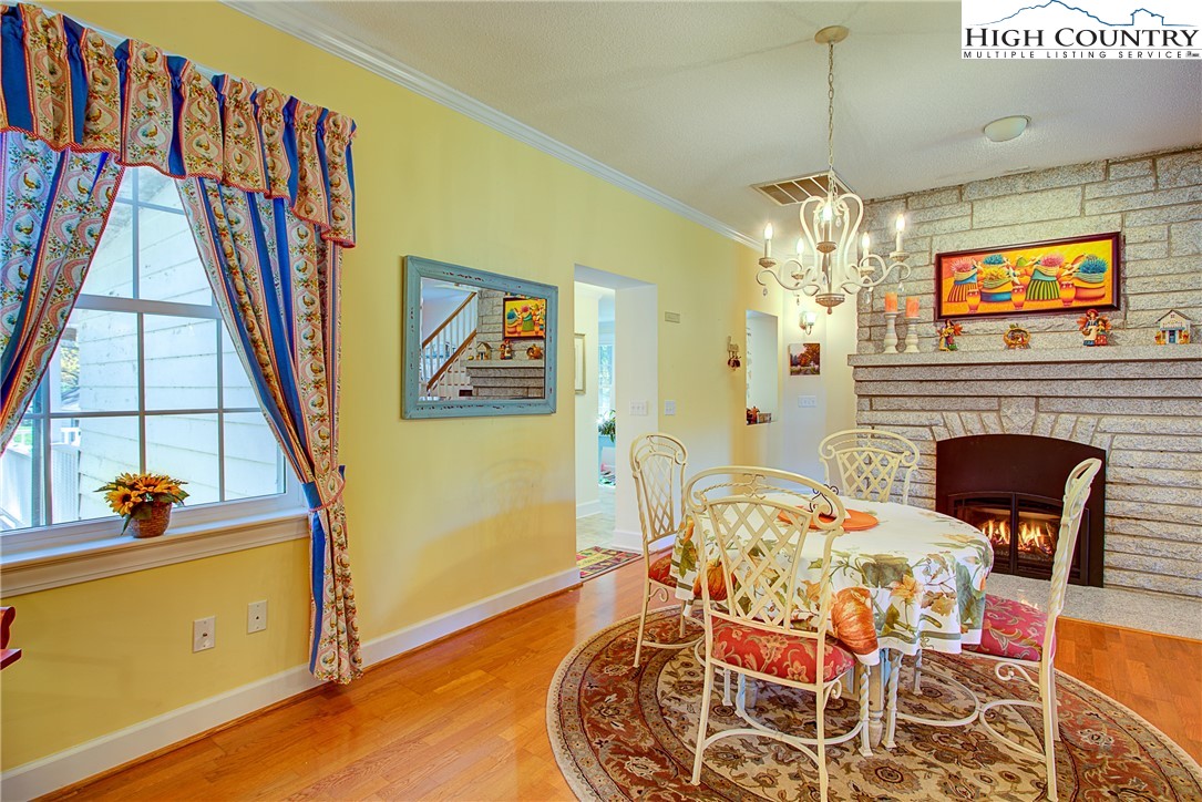 267 Vestal Road Sparta, NC 28675 - Photo 19 of 43 a view of a dining room with furniture and chandelier