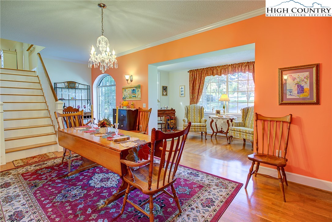 267 Vestal Road Sparta, NC 28675 - Photo 24 of 43 a view of a dining room with furniture window and wooden floor