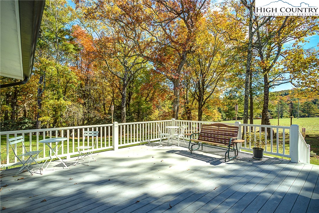 267 Vestal Road Sparta, NC 28675 - Photo 10 of 43 a view of a deck with wooden floor and fence