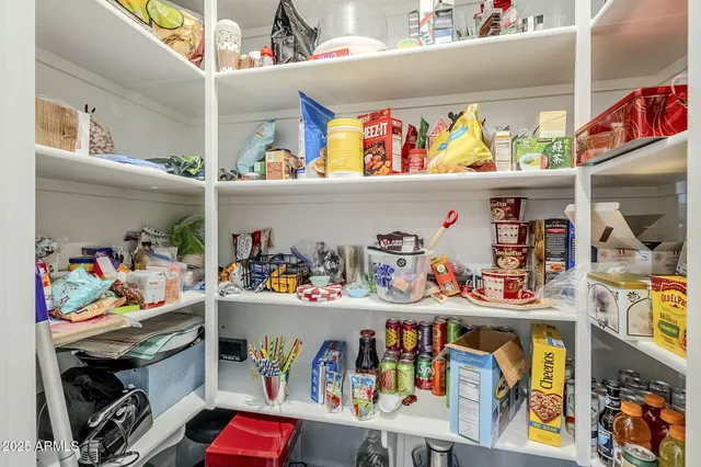 a bedroom with bed and a window