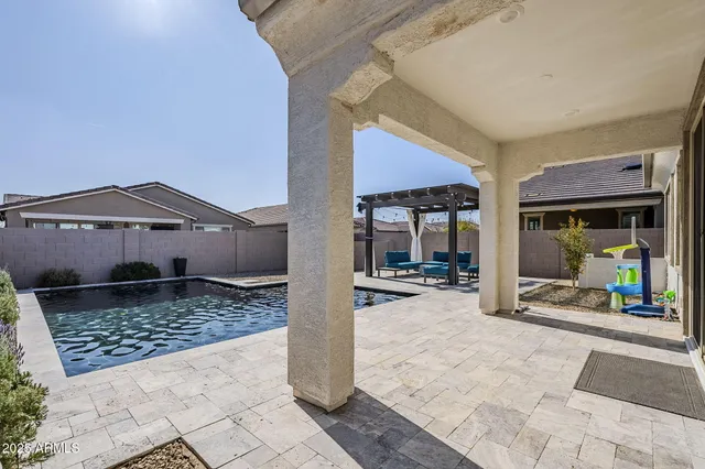 a view of a house with swimming pool