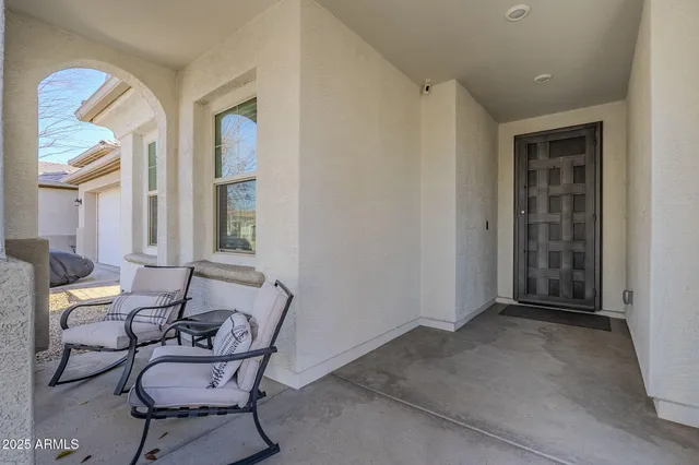 a view of a livingroom with furniture and windows