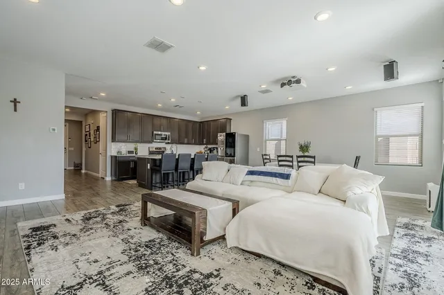 a living room with furniture and a table