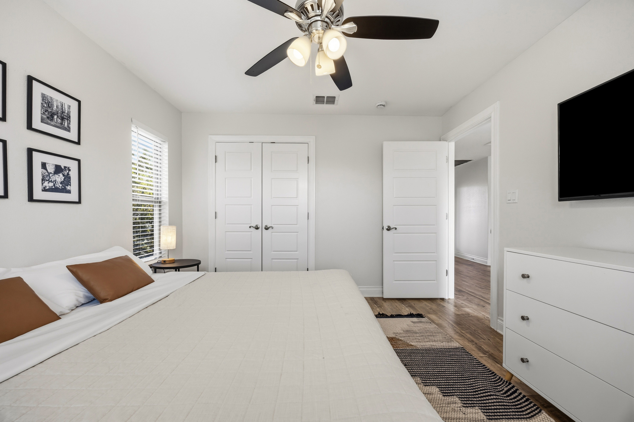 4105 Summit Hurst New Braunfels, TX 78132 - Photo 16 of 36 a bedroom with a bed and a flat screen tv