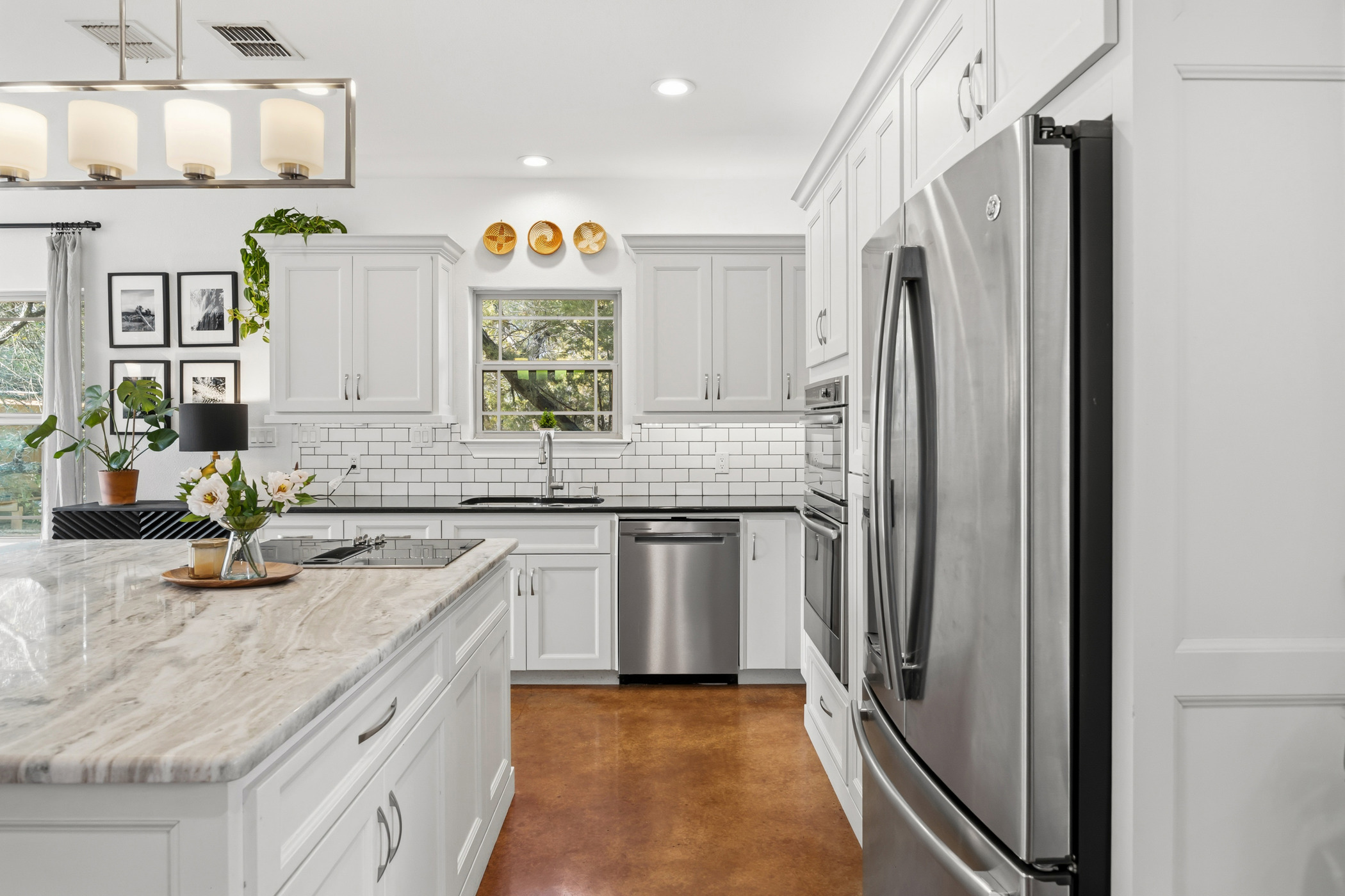 4105 Summit Hurst New Braunfels, TX 78132 - Photo 5 of 36 a kitchen with stainless steel appliances granite countertop a refrigerator and a sink