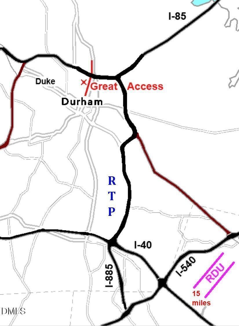 1313 Acadia Street Durham, NC 27701 - Photo 4 of 4 a picture of a door with a street sign on the wall