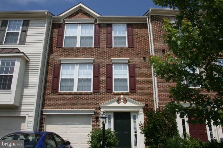 a front view of a house with balcony