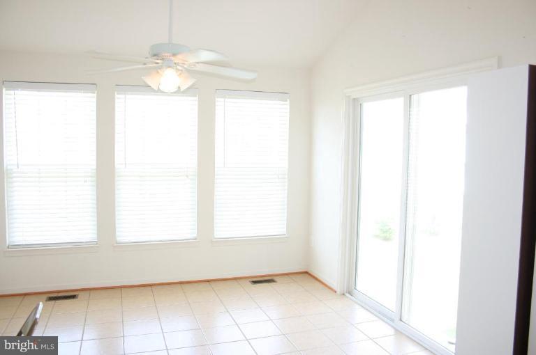 1317 Steed Street Ranson, WV 25438 - Photo 3 of 8 a view of an empty room with a window