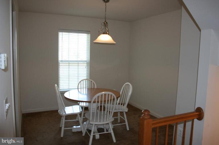 1317 Steed Street Ranson, WV 25438 - Photo 4 of 8 a dining room with furniture and window