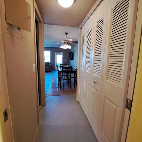 a view of a livingroom with furniture and window