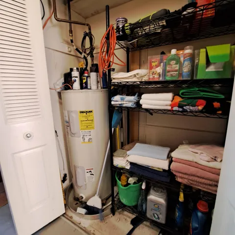 a view of storage and utility room