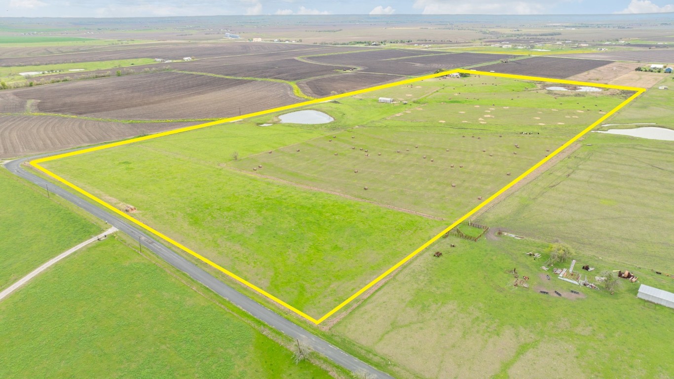 19810 Janak Road Coupland, TX 78615 - Photo 5 of 14 a view of an outdoor space and swimming pool