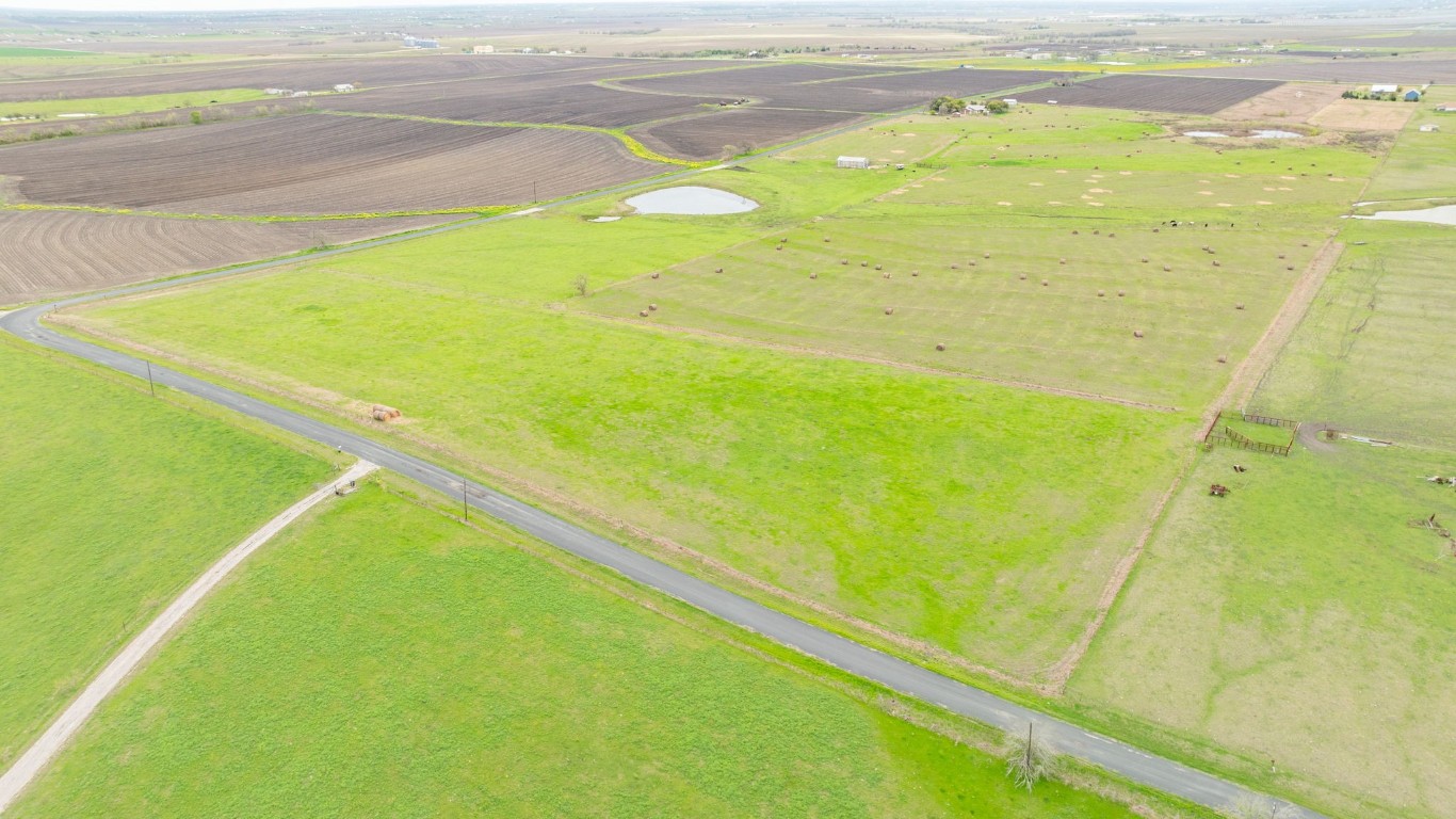 19810 Janak Road Coupland, TX 78615 - Photo 8 of 14 a view of an empty room and wooden floor