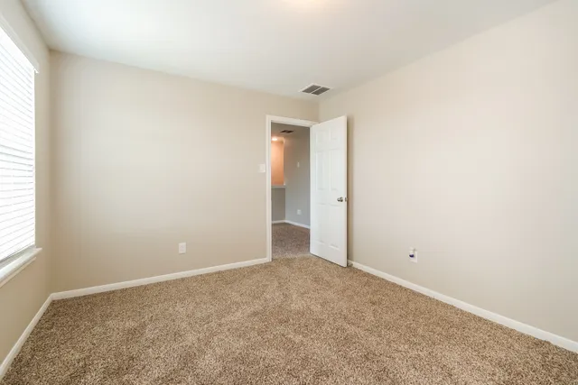 an empty room with an entryway