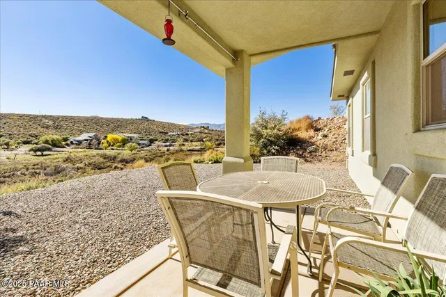 a view of a swimming pool with a lounge chairs
