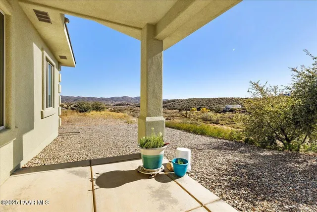 a view of a street with an ocean view