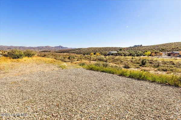 a view of an ocean and a mountain
