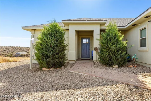 a view of a entryway door front of house