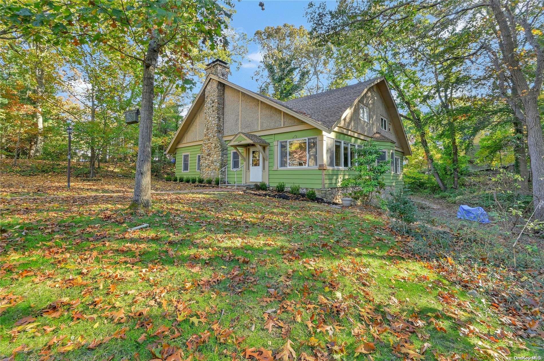16 Midwood Road Stony Brook, NY 11790 - Photo 1 of 1 front view of a house with a yard