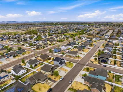 an aerial view of residential building and city