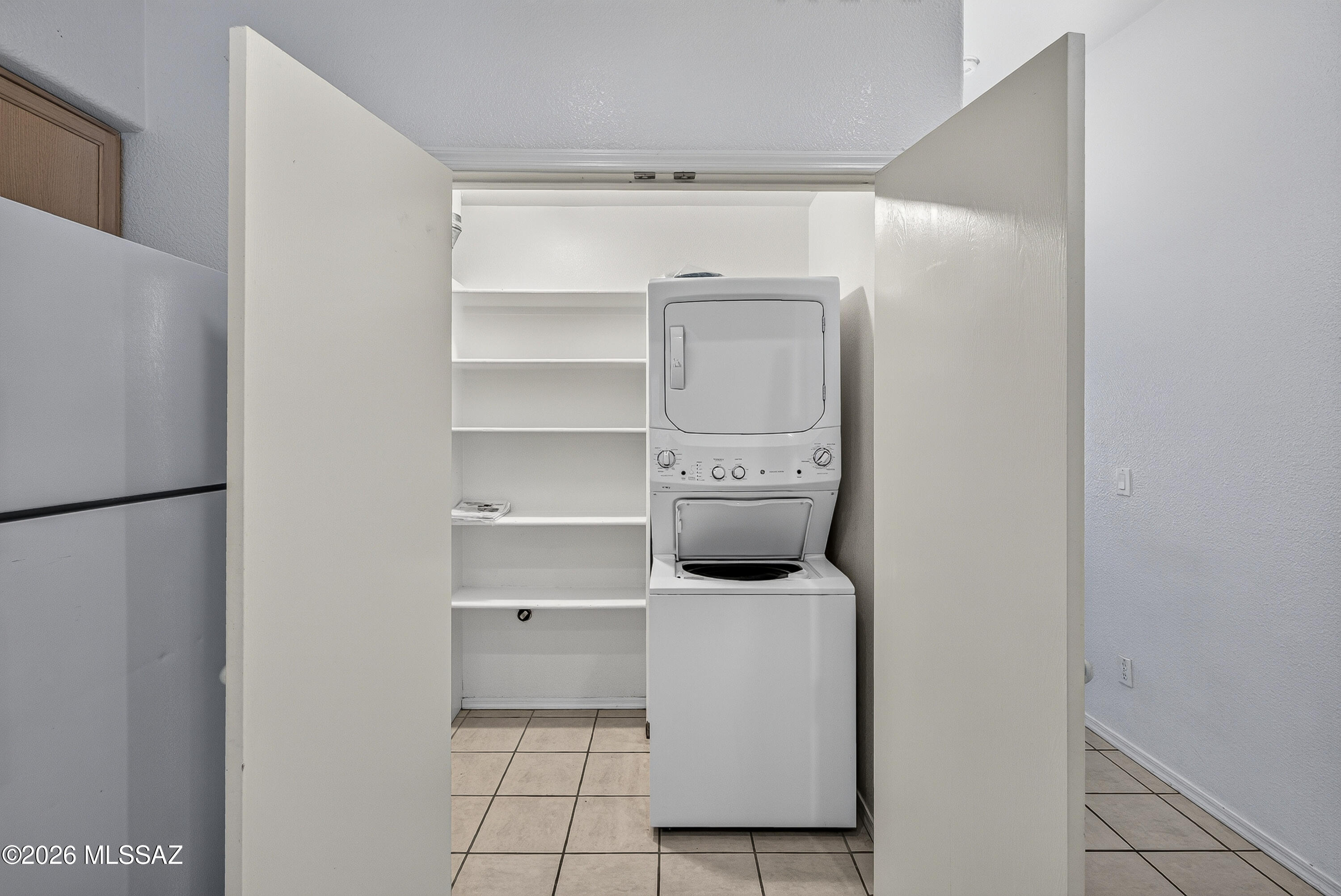 8935 East Golf Links Road Tucson, AZ 85730 - Photo 10 of 38 Indoor Laundry with Pantry