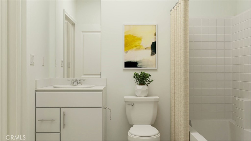 2386 Peach Tree Lane Perris, CA 92570 - Photo 19 of 23 a bathroom with a sink toilet and mirror