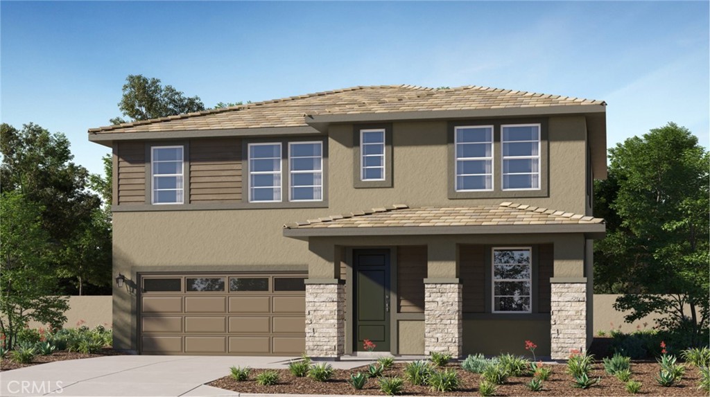 2386 Peach Tree Lane Perris, CA 92570 - Photo 20 of 23 a front view of a house with a garden