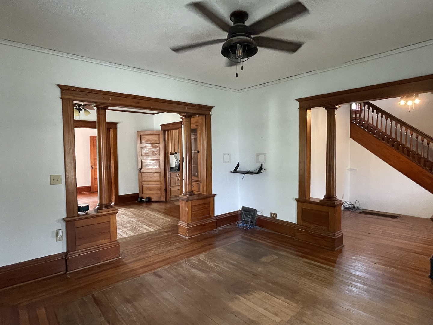 4591 Main Street Irwin, IL 60901 - Photo 8 of 29 a view of empty room with wooden floor and fan