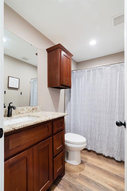 134 Private Road Paris, TX 75462 - Photo 12 of 19 a bathroom with a sink a toilet and shower
