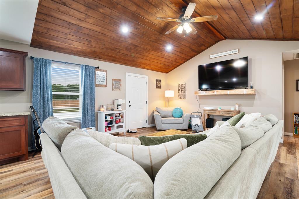 134 Private Road Paris, TX 75462 - Photo 4 of 19 a living room with furniture and a flat screen tv