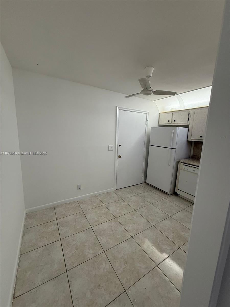 22605 Southwest 66th Avenue, Unit 409 Boca Raton, FL 33428 - Photo 18 of 19 a view of a garage