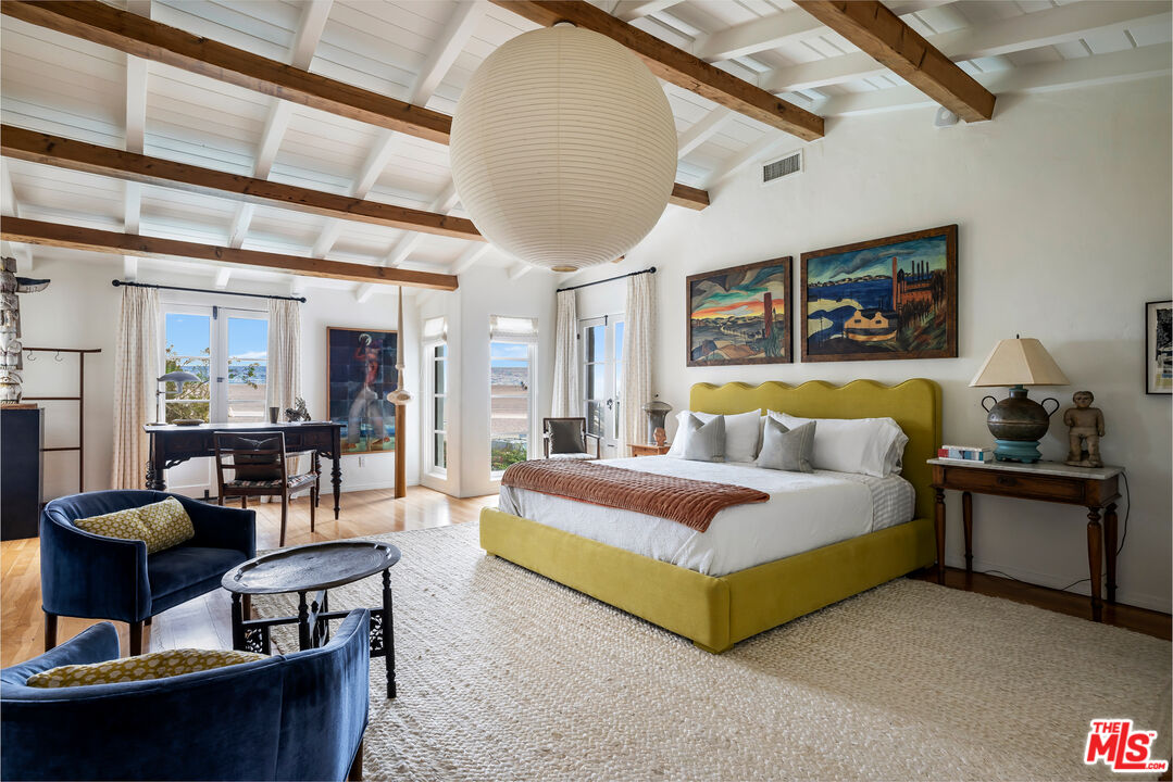 1020 Palisades Beach Road Santa Monica, CA 90403 - Photo 11 of 41 a spacious bedroom with a bed and couch